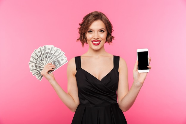 Portrait of a cheery girl dressed in black dress