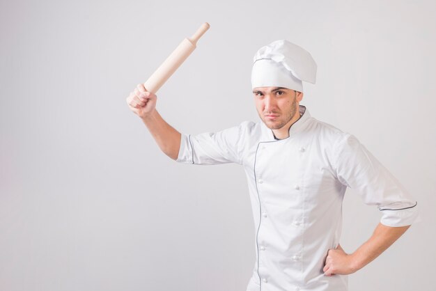 Portrait of chef with rolling pin