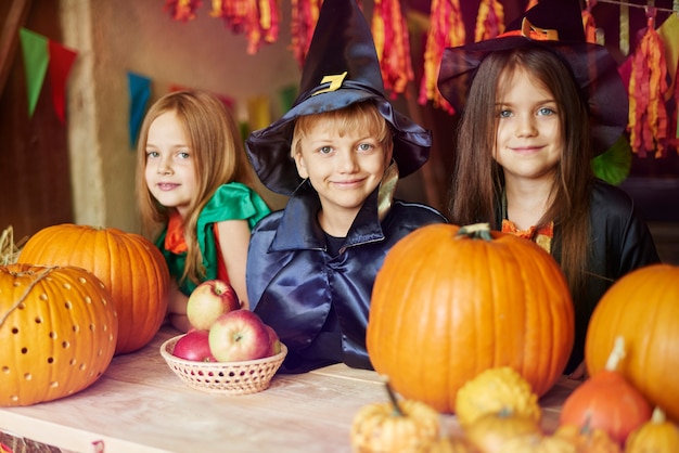 Portrait of children dressed in Halloween costumes
