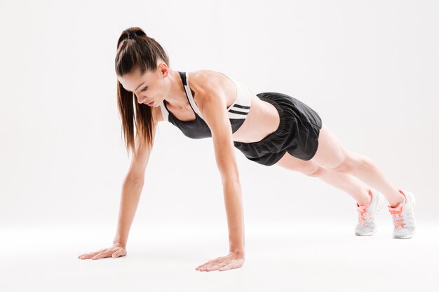 Portrait of a concentrated fitness woman