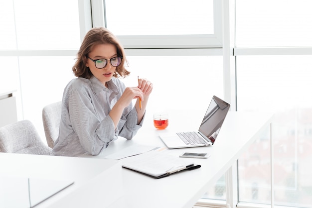 Portrait of a concentrated young woman