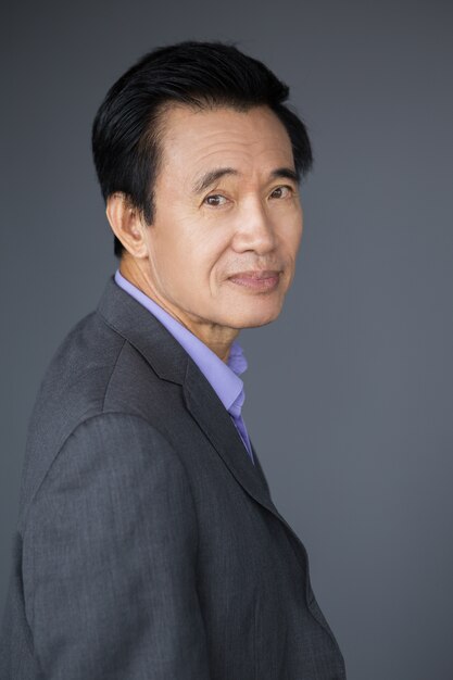 Portrait of Confident Middle-aged Asian Man