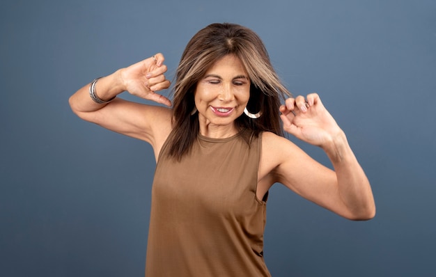 Portrait of confident senior woman posing