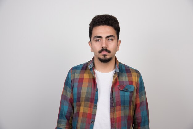 Portrait of confident serious young man.