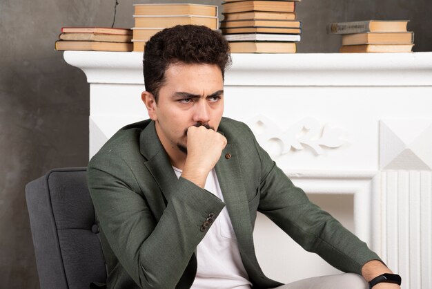 Portrait of confident thoughtful man looking away.