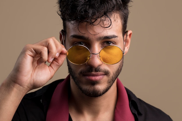 Portrait of cool handsome man with sunglasses