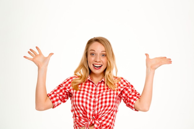 Portrait of country woman smiling on white.