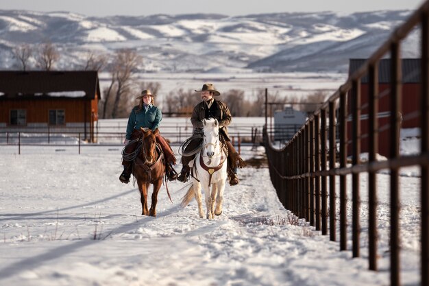 Portrait of couple on horses