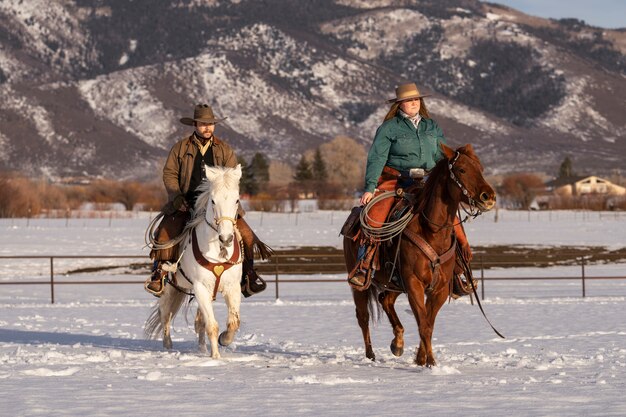 Portrait of couple on horses