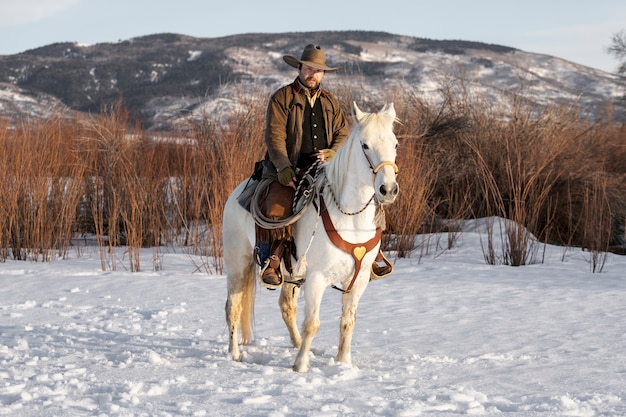 Portrait of cowboy on a horse