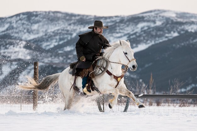 Portrait of cowboy on a horse