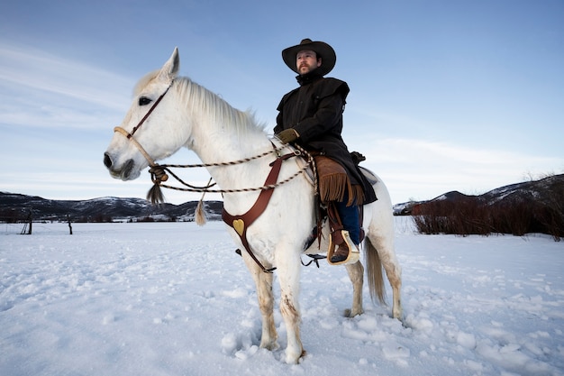 Portrait of cowboy on a horse