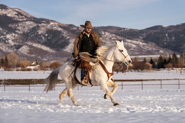 Portrait of cowboy on a horse