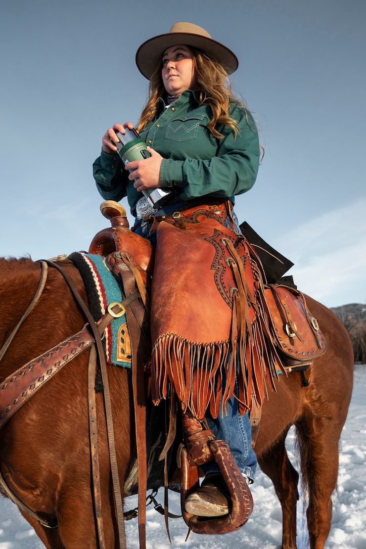Free Photo portrait of cowgirl on a horse