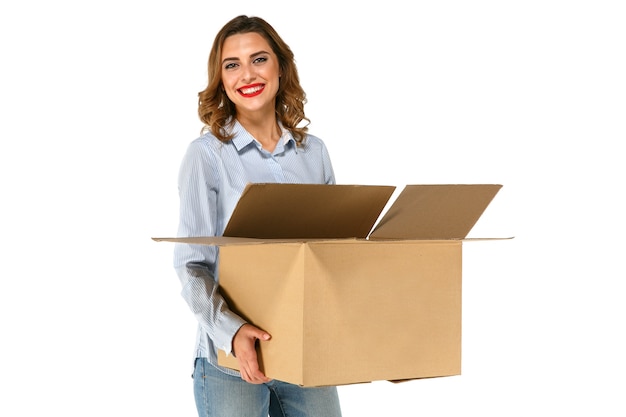 Portrait of cute attractive girl holding big cardboard box in her hands