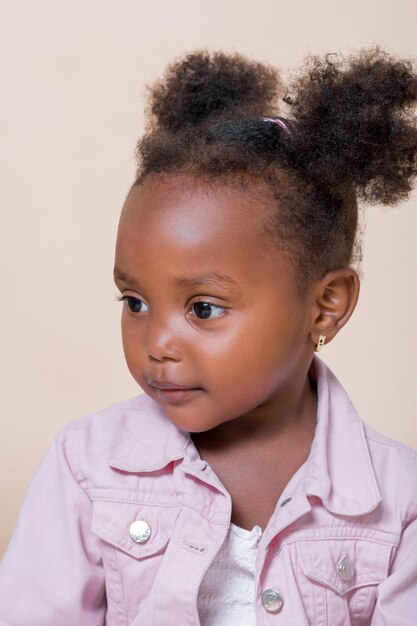 Portrait of a cute girl with curly hair