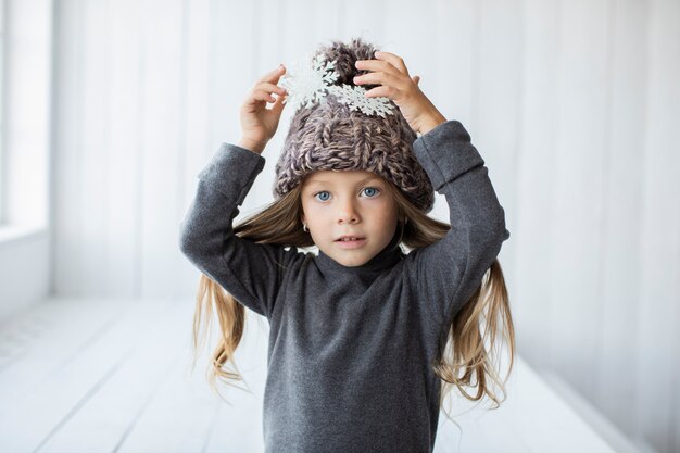 Portrait of cute little girl model posing fashion