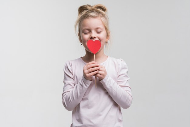 Portrait of cute little girl posing