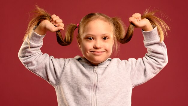 Portrait of cute little girl posing