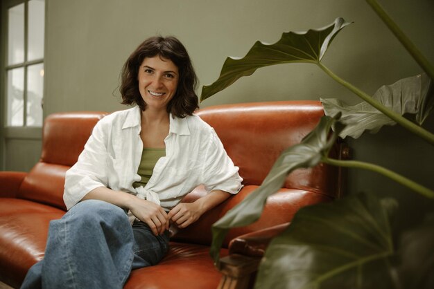 Portrait of cute woman smiling at camera