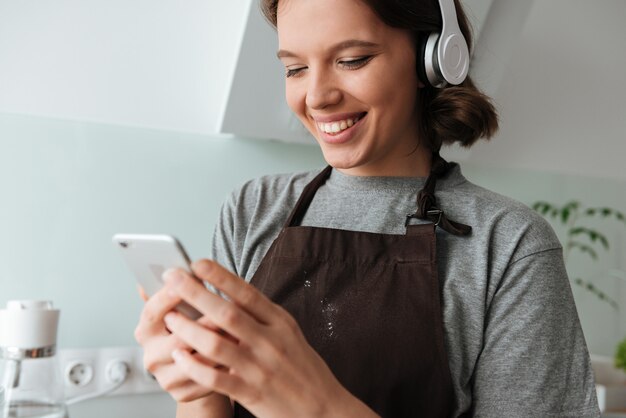 Portrait of a cute young woman in headphones