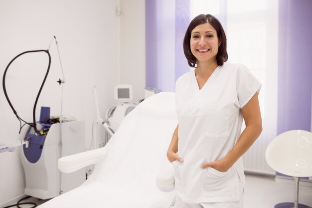 Portrait of dermatologist standing with hands in pockets