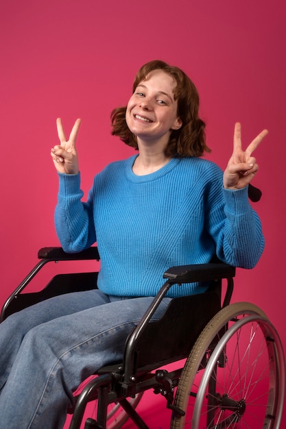 Free photo portrait of disabled woman in a wheelchair