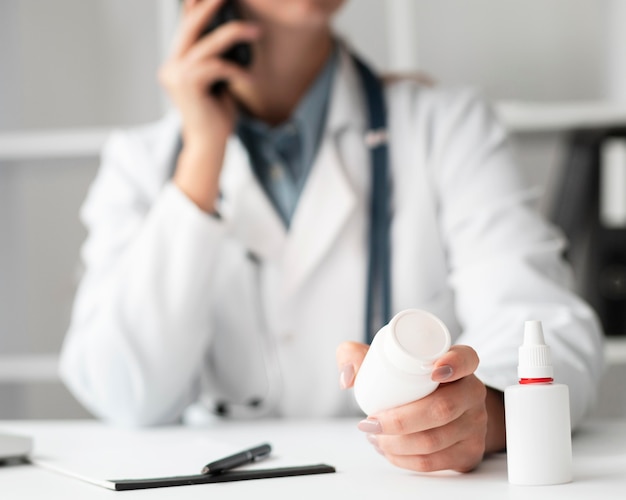 Portrait of doctor talking on the phone