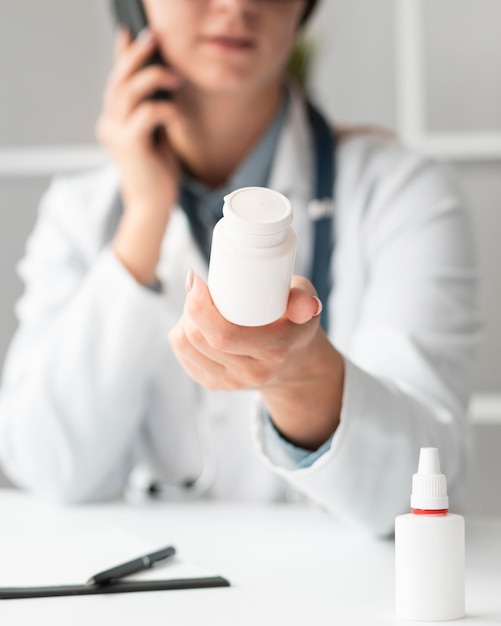 Portrait of doctor talking on the phone