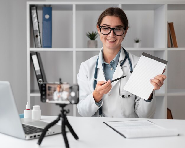 Portrait of doctor video conferencing at the clinic