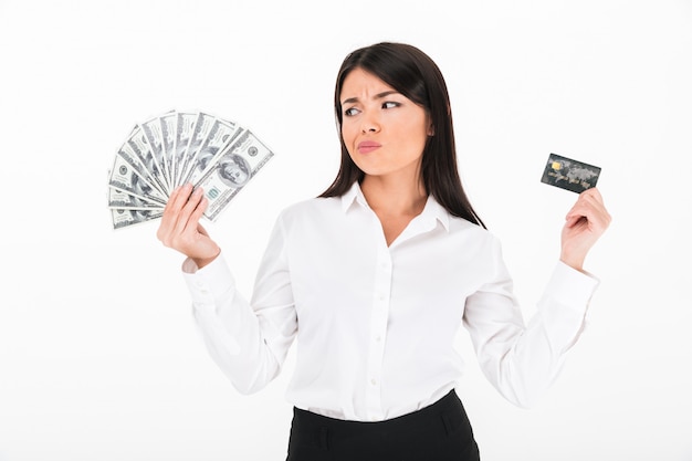 Free photo portrait of a doubtful asian businesswoman