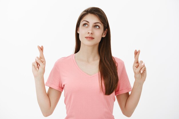 Portrait of dreamy brunette woman posing in the studio