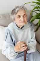 Free photo portrait of elderly grandmother relaxing at home