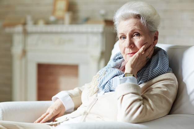 Portrait of elegant-looking elderly woman