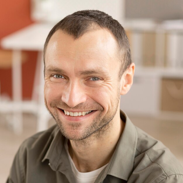 Portrait of employee happy to be back at work