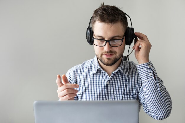 Portrait of employee with headset on