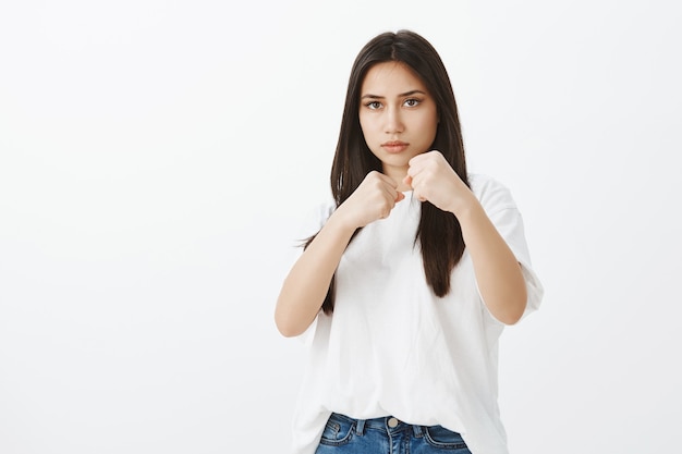 Portrait of European girl with tanned skin and dark hair