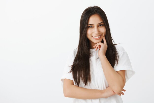 Portrait of European girl with tanned skin and dark hair