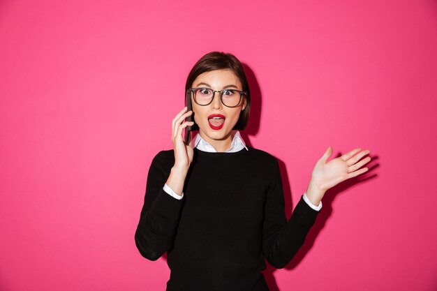 Portrait of an excited attractive businesswoman