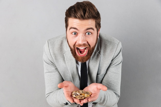 Free photo portrait of an excited businessman