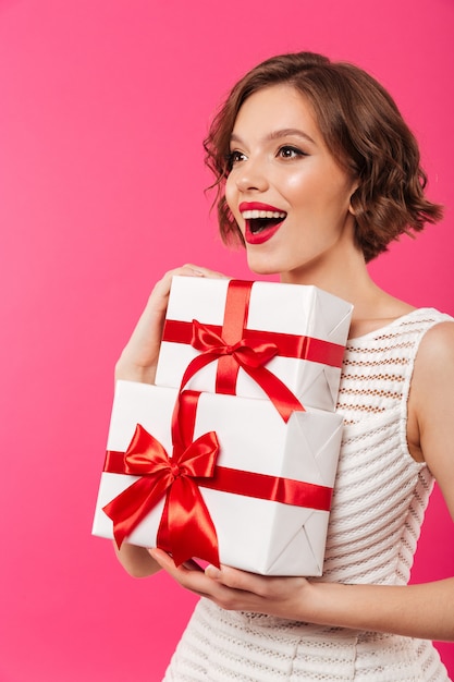 Portrait of an excited girl dressed in dress