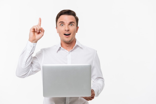 Portrait of an excited smart man in white shirt