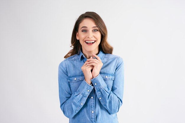 Portrait of excited woman