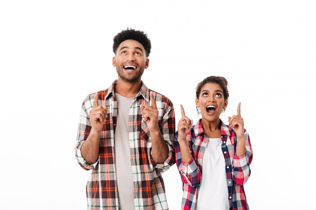 Free photo portrait of an excited young african couple