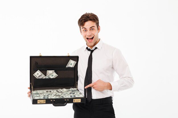 Portrait of an excited young businessman