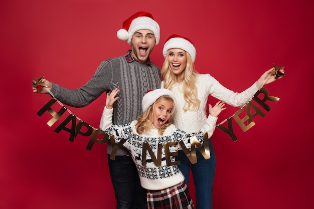 Portrait of an excited young family