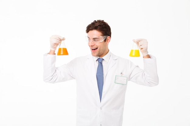 Free photo portrait of an excited young male scientist