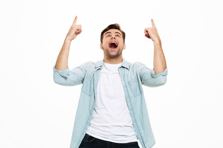 Free Photo portrait of an excited young man standing