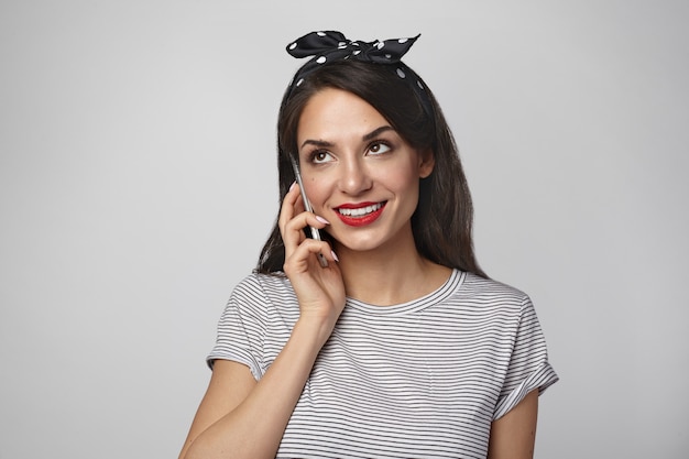 Portrait of an expressive woman posing in the studio