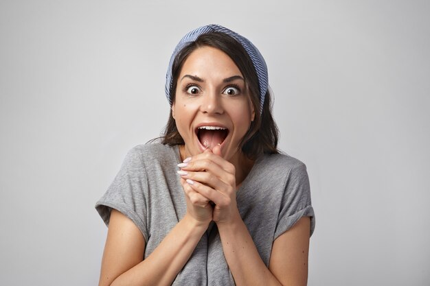 Portrait of an expressive woman posing in the studio